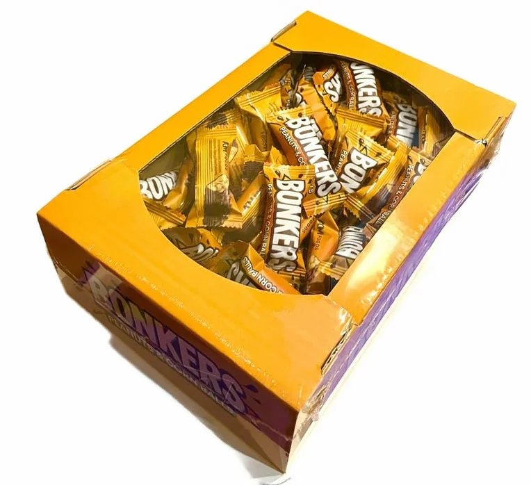 Cukierki Bonkers 1kg chrupiący baton z orzechami i kuleczkami Flying Cow AIM Shipsy Block