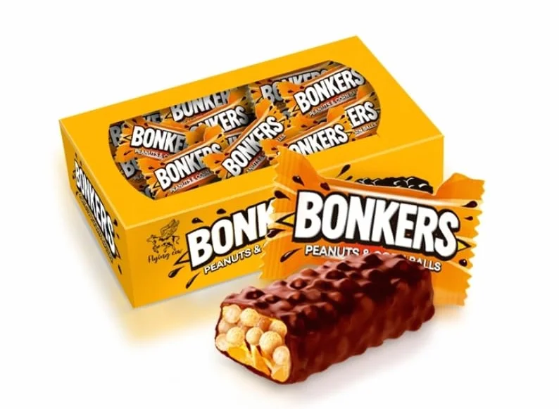 Cukierki Bonkers 1kg chrupiący baton z orzechami i kuleczkami Flying Cow AIM Shipsy Block
